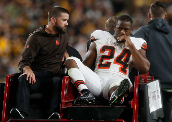Sep 18, 2023; Pittsburgh, Pennsylvania, USA; Cleveland Browns running back Nick Chubb (24) is taken from the field on a cart after suffering an apparent injury against the Pittsburgh Steelers during the second quarter at Acrisure Stadium.